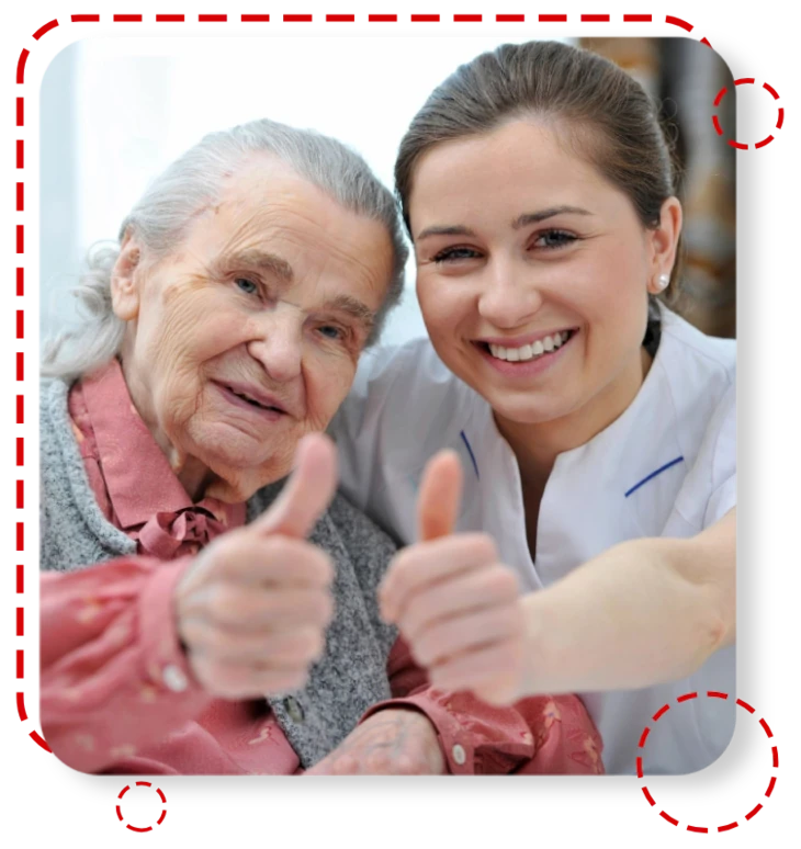 Old woman and caregiver doing thumbs up 2.2